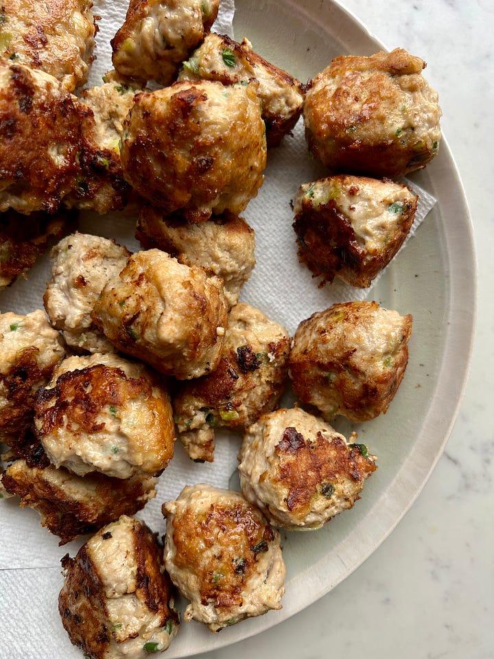 Turkey meatball ingredients in a mixing bowl and cooked meatballs on a plate.