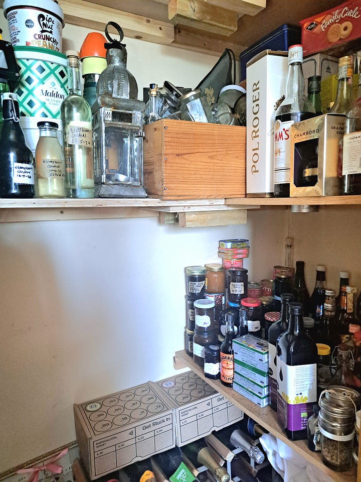 My not so perfect pantry. No art direction, no rearrangements. Preserves, jars of jams, bottles, cordials.