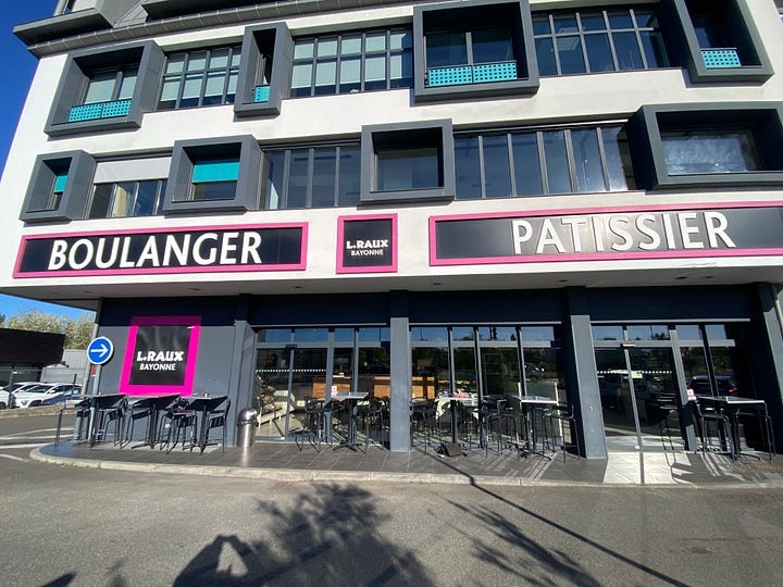 A bakery with croissants, coffee, pastries and chocolates