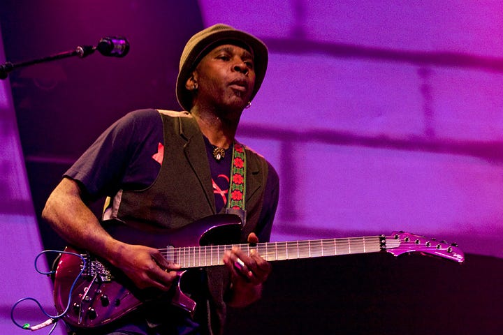 Photographs of Living Colour album covers and the band performing live