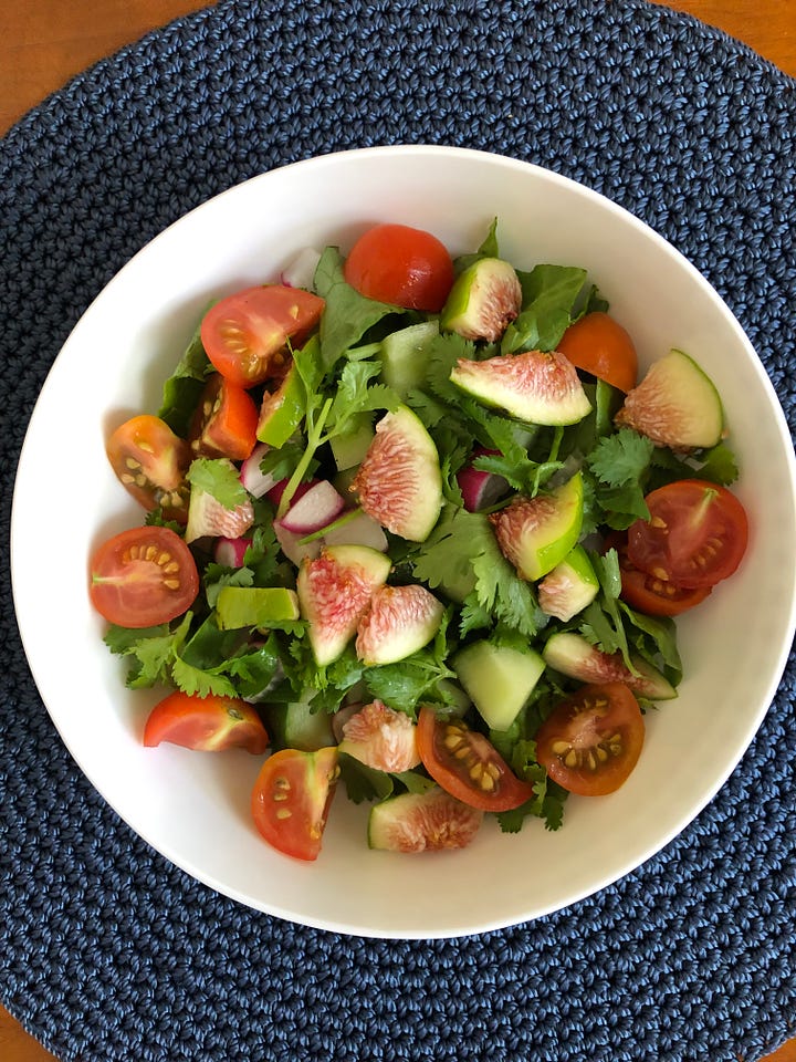 A bowl of fresh figs and a fig salad