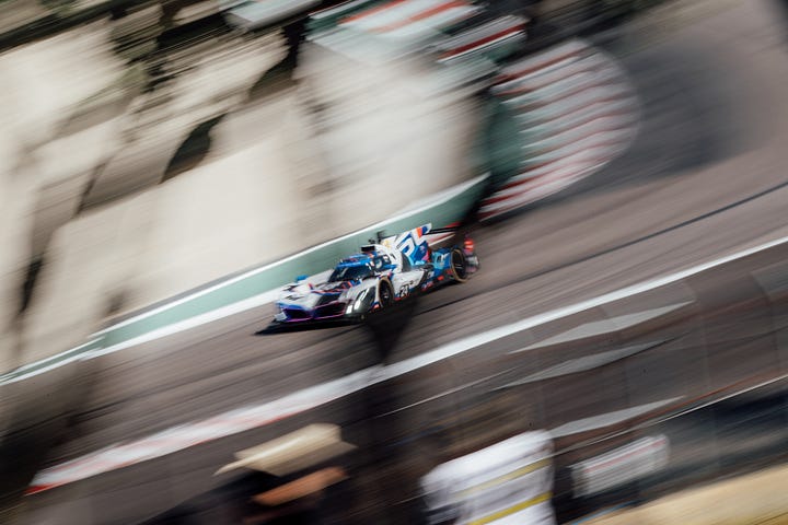 Photos of BMW M Team RLL cars attacking the track at Laguna Seca for the Monterey round IMSA sportscar championship in May 2025. Photos by Walter Fulbright.