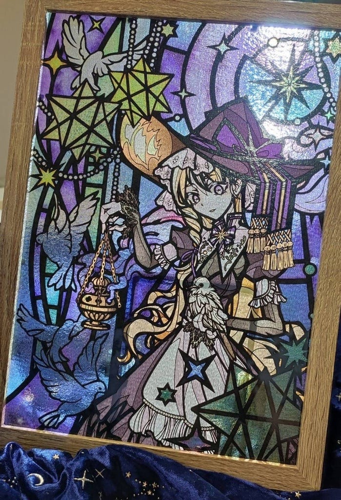 colourful stained glass illustrations of Touhou characters.