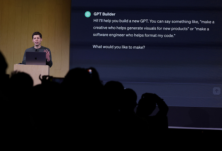OpenAI CEO Sam Altman builds a custom GPT during the OpenAI DevDay event Monday in San Francisco. (Justin Sullivan / Getty Images)