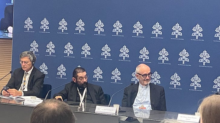 Vatican communications prefect Paolo Ruffini, Bishop Daniel Flores, and Cardinal Michael Czerny at a Vatican press conference. Credit: JD Flynn/ Pillar Media.