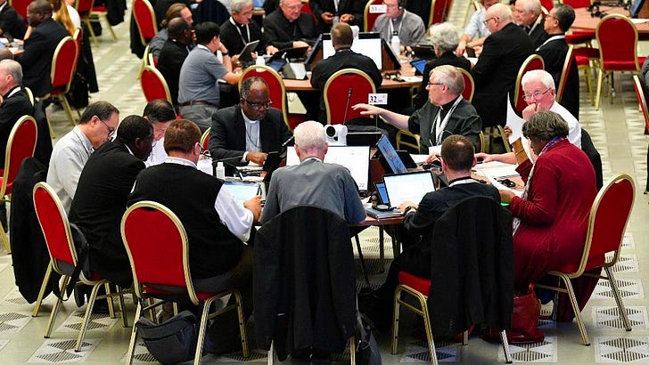 Participants work during a meeting of the synod of bishops on synodality. Credit: Vatican Media.