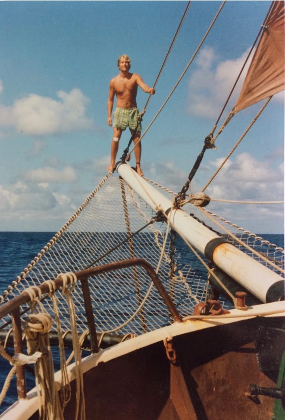 Paul Fenn on the bowsprit of the ketch Adelaar, Fiji to New Zealand, 1988