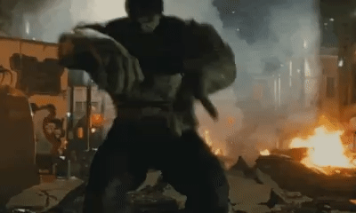 The Hulk yelling while the city behind him is in embers.
